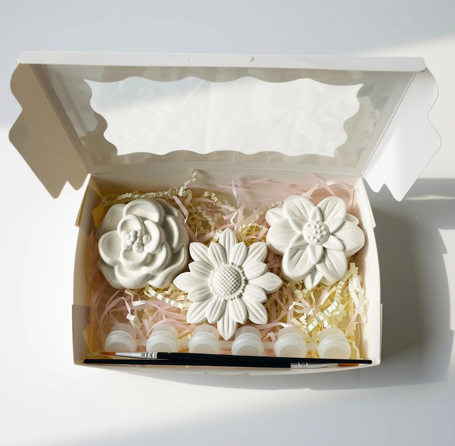 Boutique Flowers plaster painting kit with three detailed flowers, paints and brushes