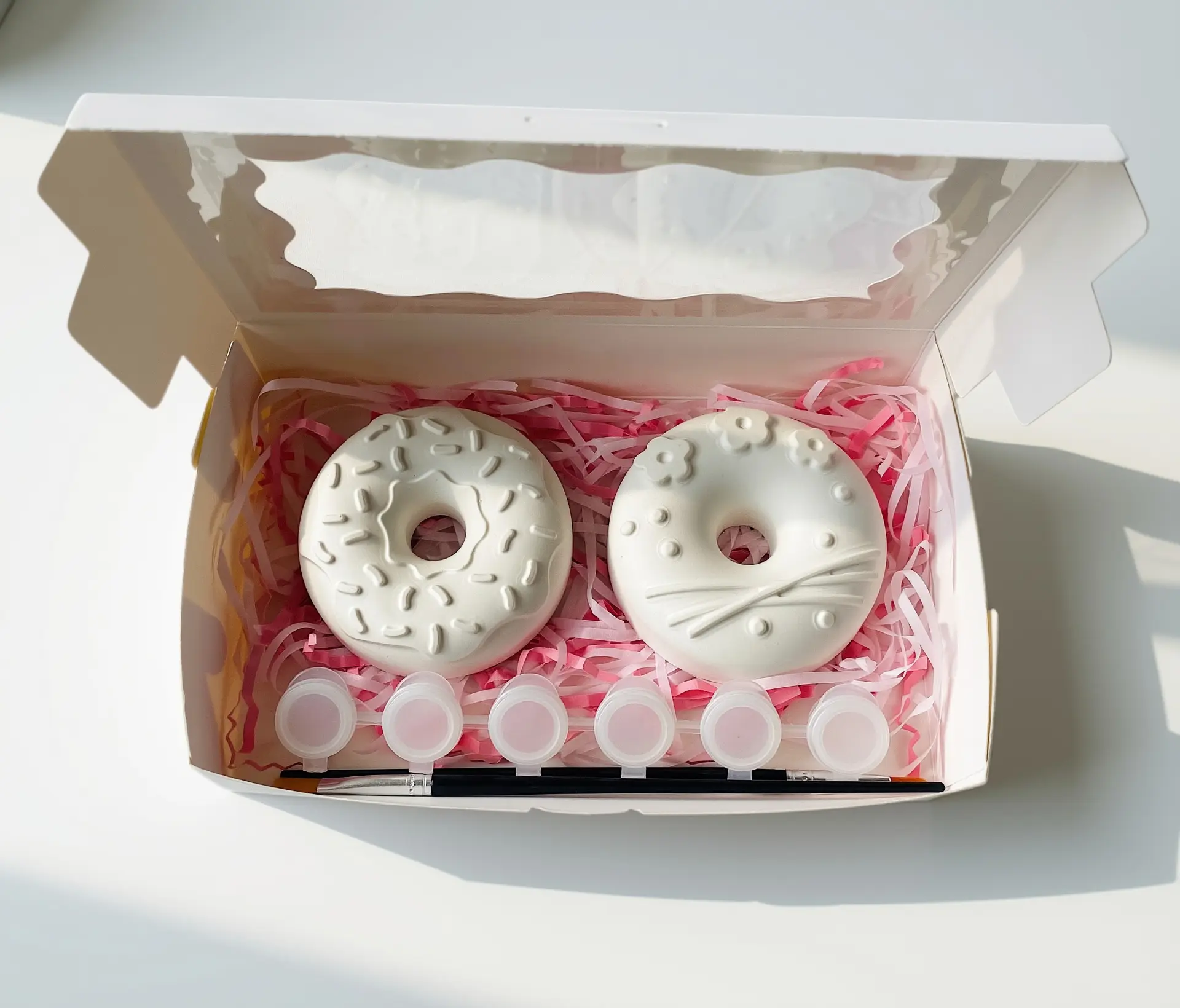 Sprinkle and Flower donut plaster painting kit with two decorated donut pieces